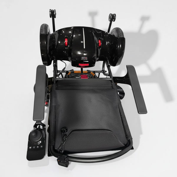 Dash Lunar Powerchair with armrests, joystick control, and large rear wheels, side view.