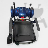 Dash Rehab Dash Lunar Powerchair with sleek wheels, armrests, and left-side joystick, compact design, side view.