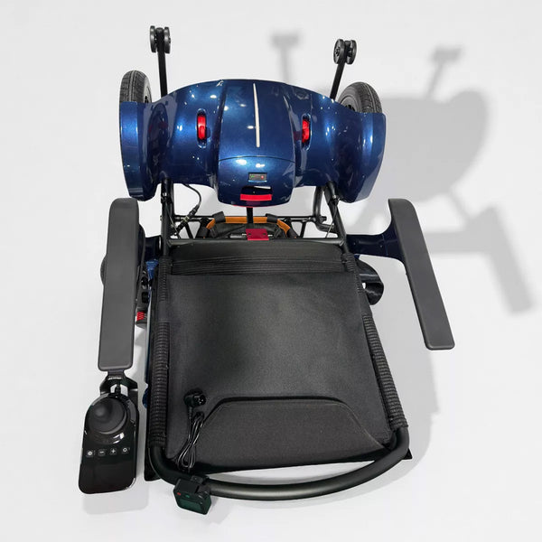 Dash Rehab Dash Lunar Powerchair with sleek wheels, armrests, and left-side joystick, compact design, side view.