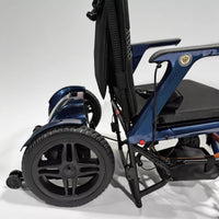 Dash Rehab Dash Lunar Powerchair with large wheels and padded seat, plain background, side view.