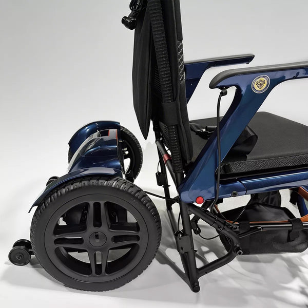 Dash Rehab Dash Lunar Powerchair with large wheels and padded seat, plain background, side view.