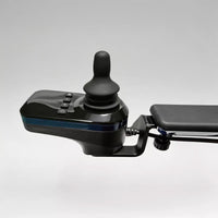 Dash Rehab Dash Lunar Powerchair joystick controller with buttons on armrest, grey background, close-up view.