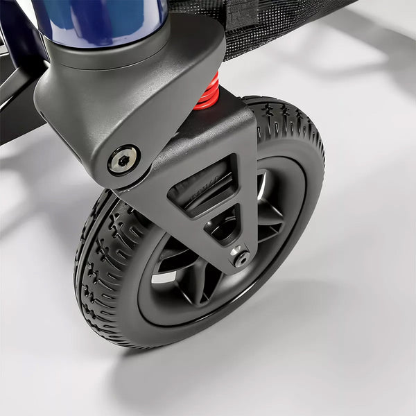 Dash Rehab Dash Lunar Powerchair with wheel suspension and red spring, close-up view.