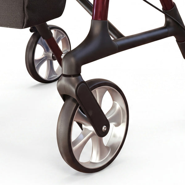 Dash Rehab Dash Swish Carbon Rollator front wheels with black tyres and silver spokes on white background, close-up.