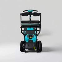 Dash Rehab Dash Z1 Scooter with handle, wheels and safety labels on a plain grey background, front view.