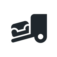 Black and white icon showing a hand truck carrying loaves of bread, side view.