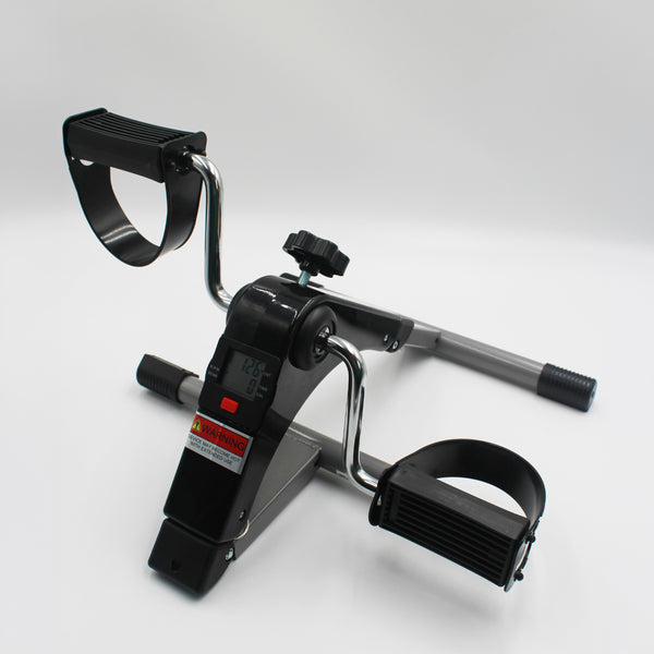 Drive digital pedal exerciser with adjustable resistance and digital display, plain background, front angle.