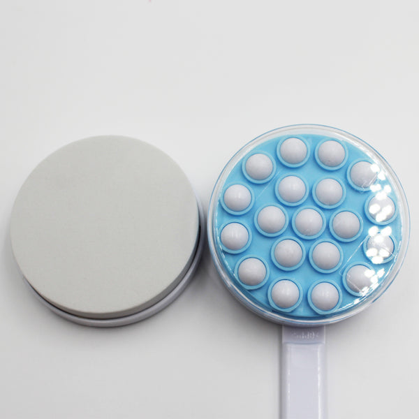 Homecraft Dual Function Lotion and Cream Applicator with pad and tool featuring white balls, on white background, front view.