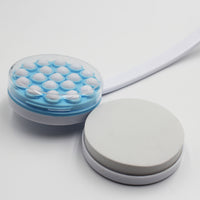 Homecraft Dual Function Lotion and Cream Applicator with long handle, massage head, and round pumice stone, front view.