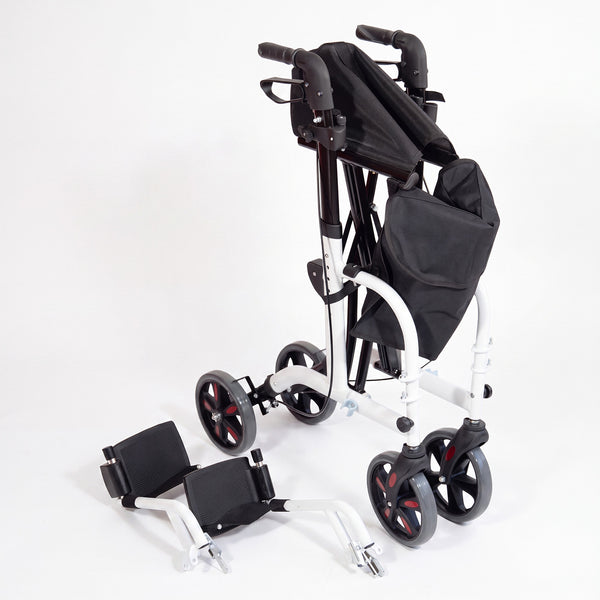 Aidapt Duo Deluxe Rollator with ergonomic handles and detachable footrests, folded on the floor, side view.
