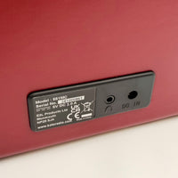 OER Easy Radio product label with model and serial number, rear view.