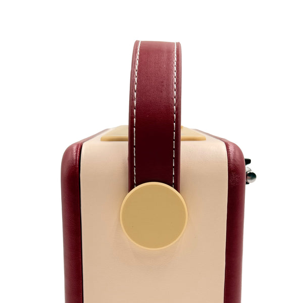 OER Easy Radio portable DAB+ radio with top carry handle, side view.