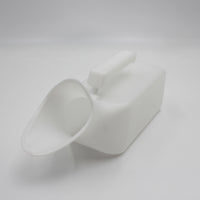 Homecraft Economy Female Urinal with handle and wide angled spout on plain background, side view.