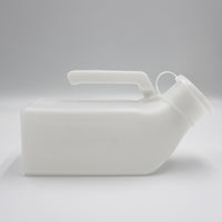 Economy male urinal with handle and angled spout, shown lying on its side against a plain background, side view.