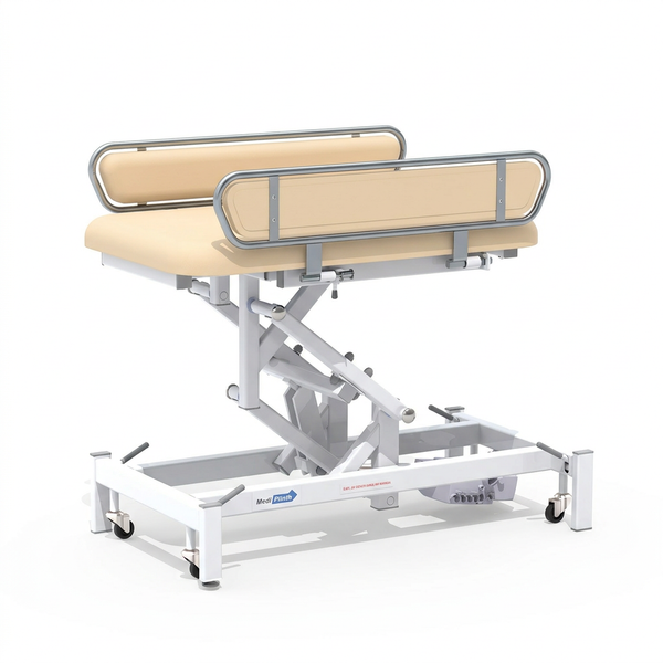 Medi-Plinth electric changing table with metal rails and wheels for wheelchair transfers, NHS-approved, side view.