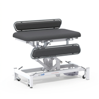Medi-Plinth Electric Changing Table, adjustable with wheeled frame, NHS-approved and MRSA-resistant, front view.