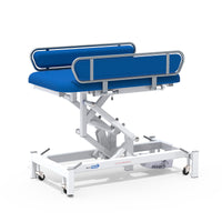 Medi-Plinth electric changing table with MRSA-resistant upholstery, side rails and mobile white metal base, side view.