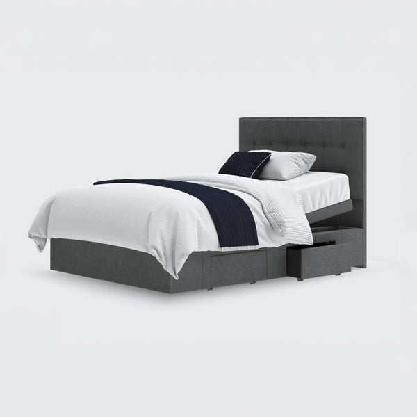 Emerald Motion Adjustable Divan Bed with built-in storage drawers, white bedding and dark blue throw, front view.