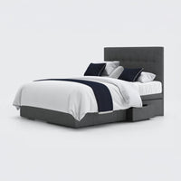 Opera Beds Emerald Motion Adjustable Divan Bed with built-in storage drawers, white and navy bedding, front view.