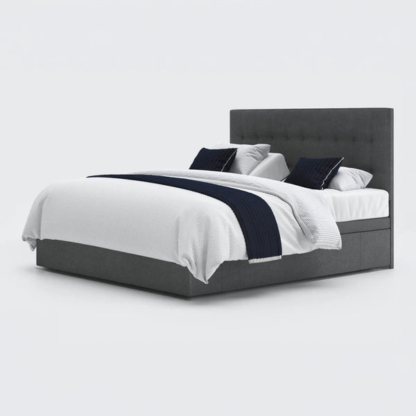 Emerald Motion Adjustable Divan Bed with tall headboard, white bedding and navy accents, front view.