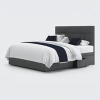 Opera Beds Emerald Motion Adjustable Divan Bed with tufted headboard and open storage drawers, side view.