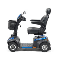 Drive Envoy 8 Scooter with basket, armrests and headrest on white background, side view.