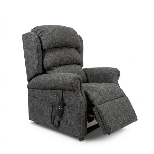 Repose Seating ErgoRise Dual Motor Tilt-In-Space Chair with padded cushions, lumbar support and side pocket remote, front angle view.