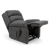 Repose Seating ErgoRise Dual Motor Tilt-In-Space Chair with lumbar support, extended footrest and remote, side view.