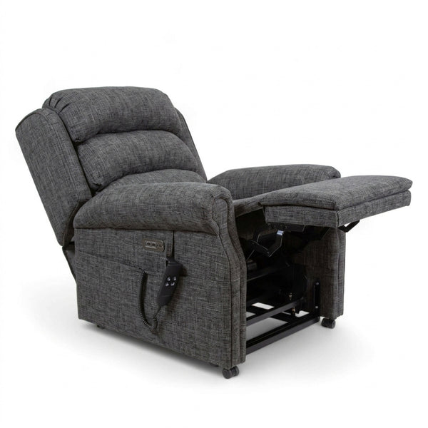 Repose Seating ErgoRise Dual Motor Tilt-In-Space Chair with lumbar support, extended footrest and remote, side view.