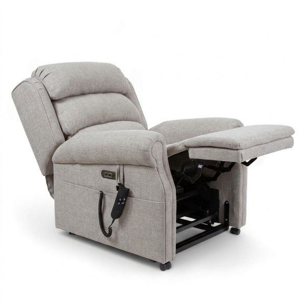 Repose Seating ErgoRise Dual Motor Tilt-In-Space Chair with adjustable headrest, footrest and wired remote, side view.