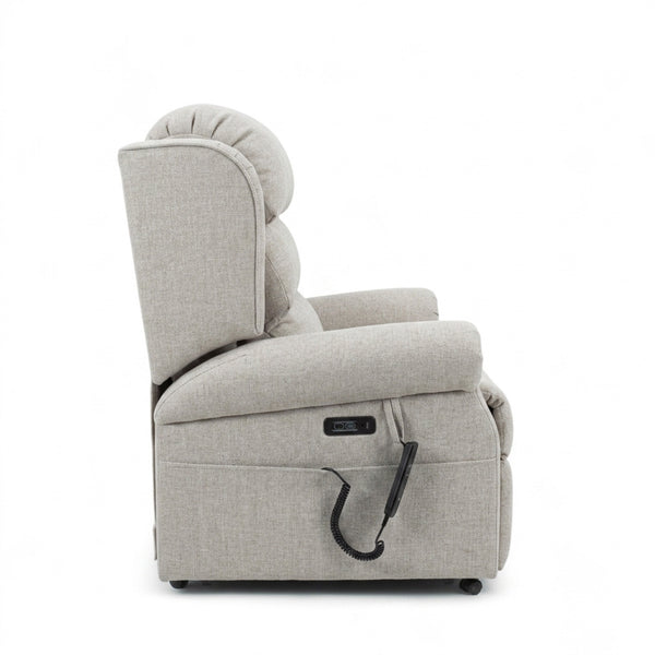 Repose Seating ErgoRise Dual Motor Tilt-In-Space Chair with adjustable headrest and right-side remote, side view.