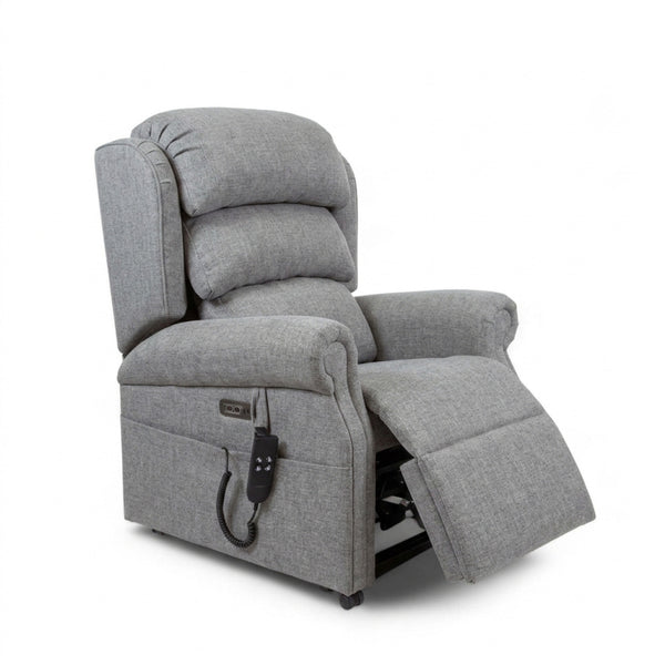 Repose Seating ErgoRise Dual Motor Tilt-In-Space Chair with extended footrest and corded remote control, front view.