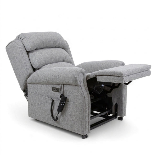 Repose Seating ErgoRise Dual Motor Tilt-In-Space Chair with extended footrest, lumbar support and side remote, front view.