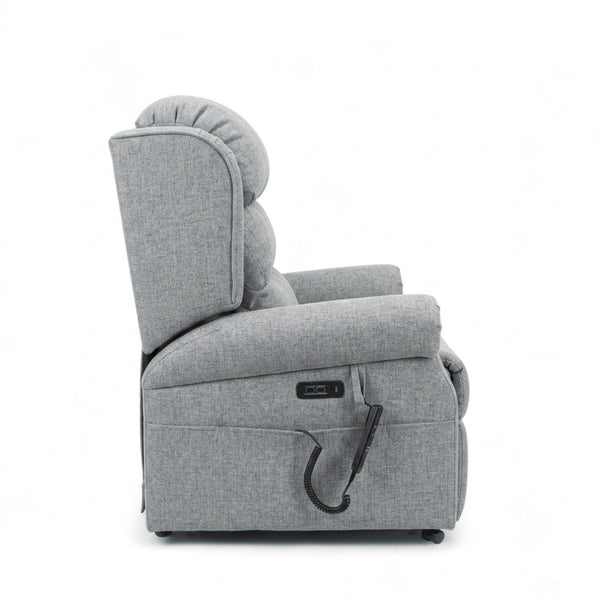 Repose Seating ErgoRise Dual Motor Tilt-In-Space Chair with remote, white background, side view.