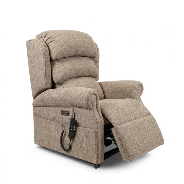 Repose Seating ErgoRise dual motor tilt-in-space chair with adjustable headrest, remote and extended footrest, side view.
