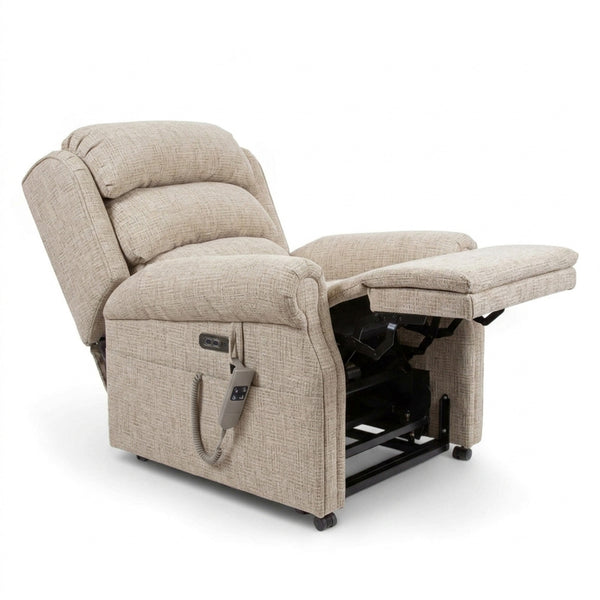 Repose Seating ErgoRise dual motor tilt-in-space chair with adjustable headrest, footrest and side remote, front view.