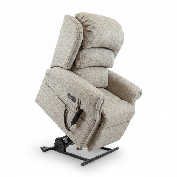 Partially raised ErgoRise Dual Motor Tilt-In-Space Chair by Repose Seating with side remote, side view.