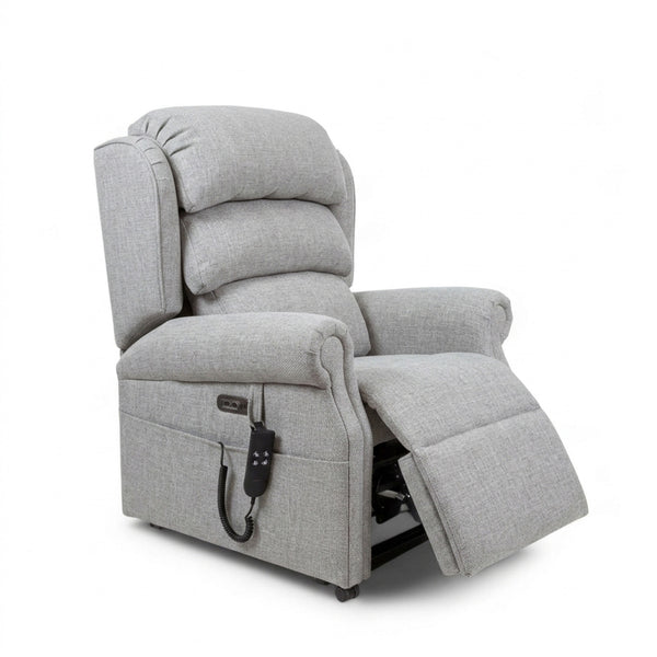 Repose Seating ErgoRise Dual Motor Tilt-In-Space Chair with lumbar support, extended footrest and side remote, front angle view.