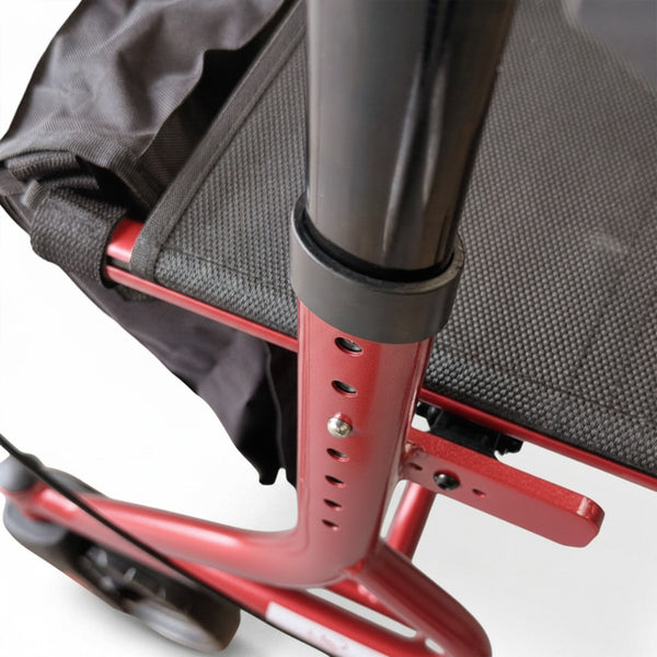 Z-Tec Falcon XL Lightweight Rollator with mesh seat, black wheels and adjustable handles, close-up view.