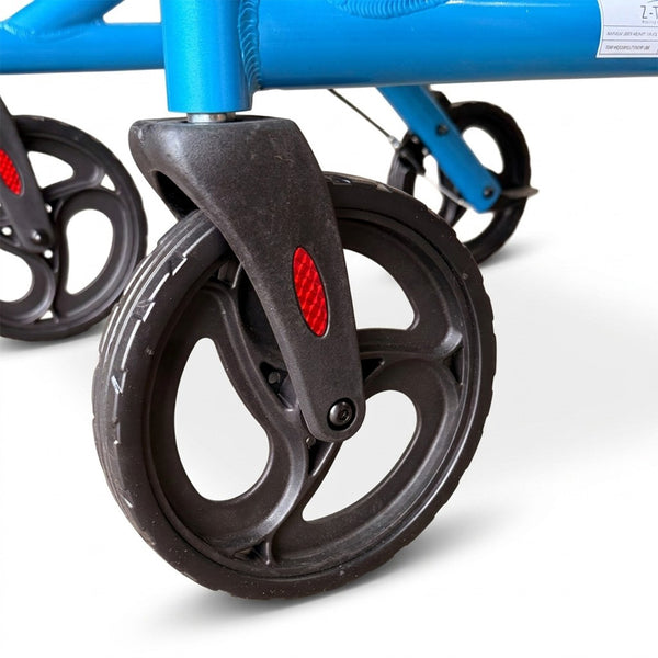 Close-up of black wheels with red reflectors on Z-Tec Falcon XL Lightweight Rollator, close-up view.