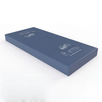 Firm Edge Mattress by Thorpe Mill with white branding and pressure-relief foam on a white background, angled view.