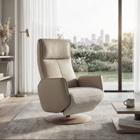 Modern Motion Fitzroy Riser Recliner in a bright living room with city views and neutral decor, front view.
