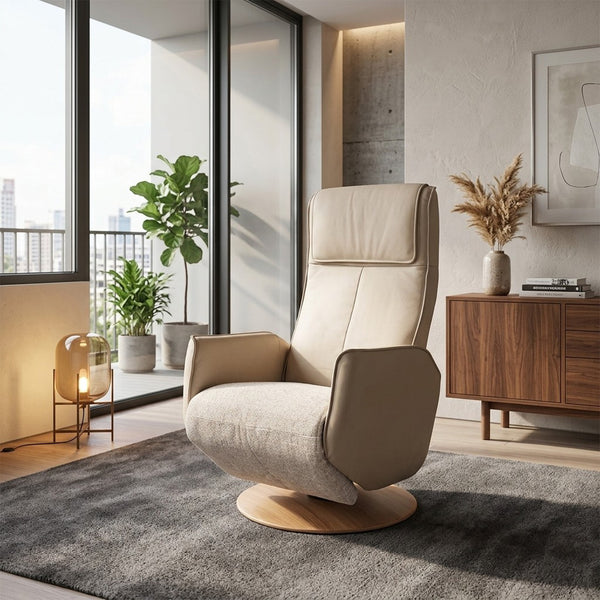 Modern Motion Fitzroy riser recliner chair on grey rug, with plants and wood decor in a living room, front angle.
