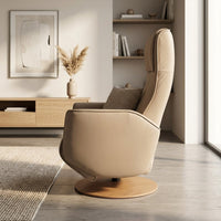 Modern Motion Fitzroy riser recliner swivel chair in a bright minimalist room with wood accents and large windows, front view.