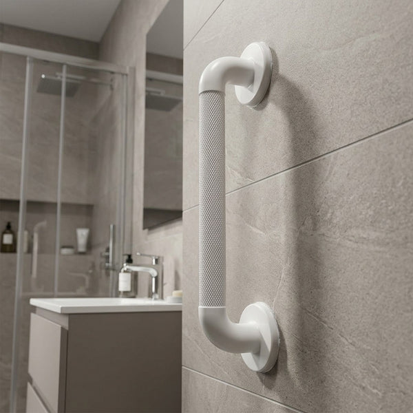 Fluted grab rail with extra grip, fitted beside a sink on tiled wall, shower area in background, side view.