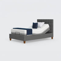 Opera Beds Flyte Adjustable Bed with Zero Gravity, white mattress, blue blanket and pillows on a white background, front view.