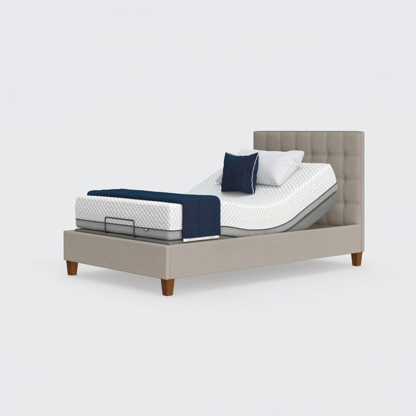 Opera Beds Flyte Adjustable Bed with Zero Gravity, tufted headboard, white mattress, blue cover and multiple pillows front view.