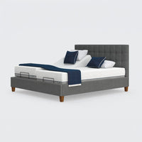 Opera Beds Flyte Adjustable Bed with tufted headboard, white mattress and blue bedding, Zero Gravity feature, front view.