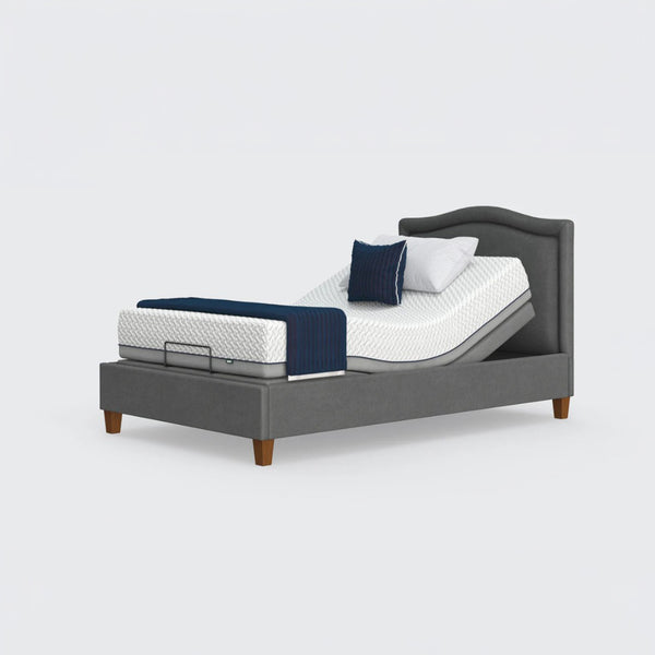Opera Beds Flyte Adjustable Bed with blue and white bedding and two pillows on a white background, front view.