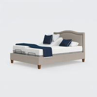 Flyte Adjustable Bed by Opera Beds with twin Zero Gravity mattresses, blue pillows and blue throw, front view.